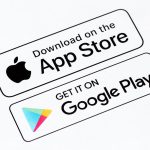 Close-up shot of App Store and Google Play download buttons