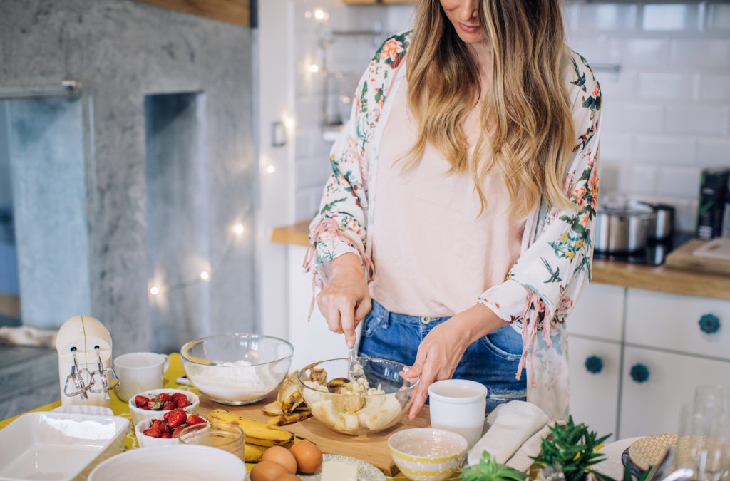 woman baking and cooking in her kitchen at home