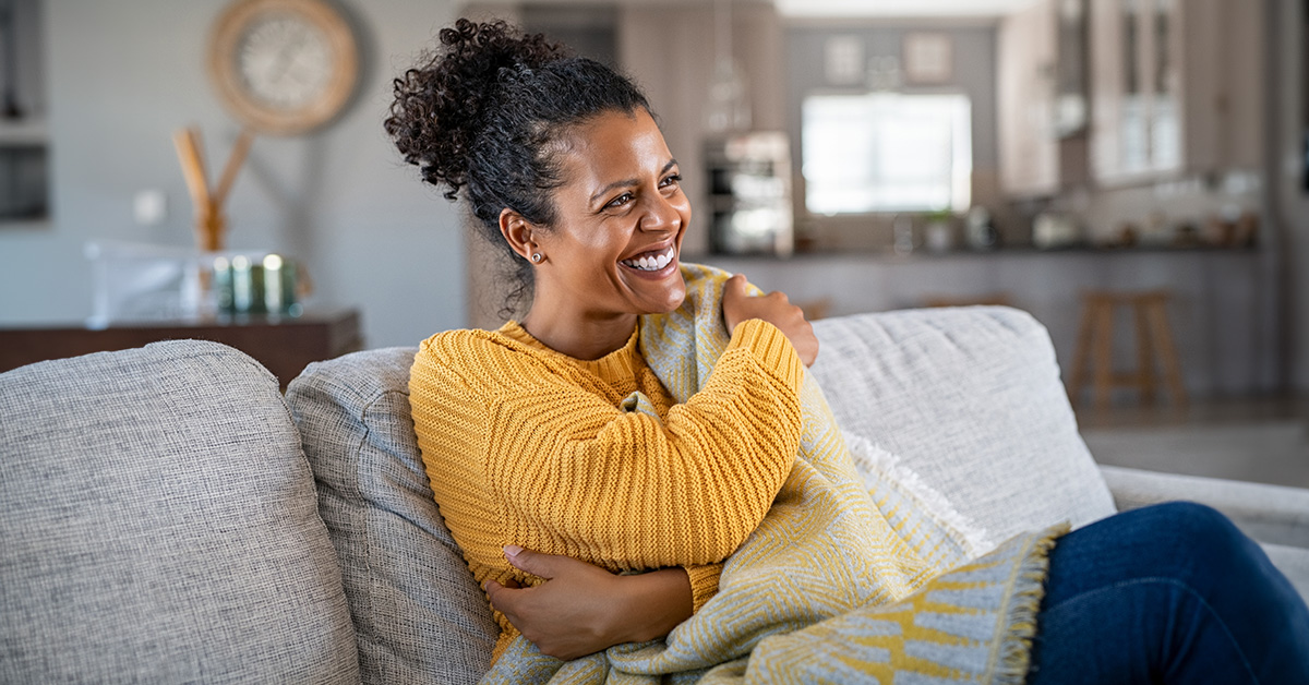 woman-cosy-under-blanket